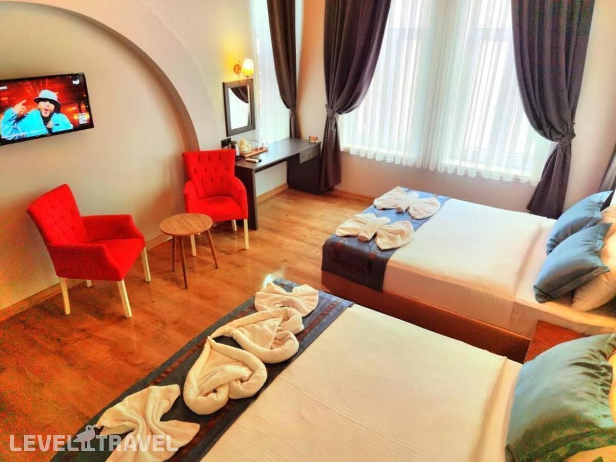фотографии номера Трехместный делюкс отеля The Independent Hotel Taksim в Турция(Бейоглу) - фото №3