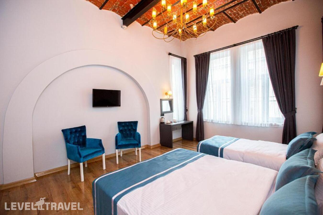 фотографии номера Трехместный делюкс отеля The Independent Hotel Taksim в Турция(Бейоглу) - фото №5