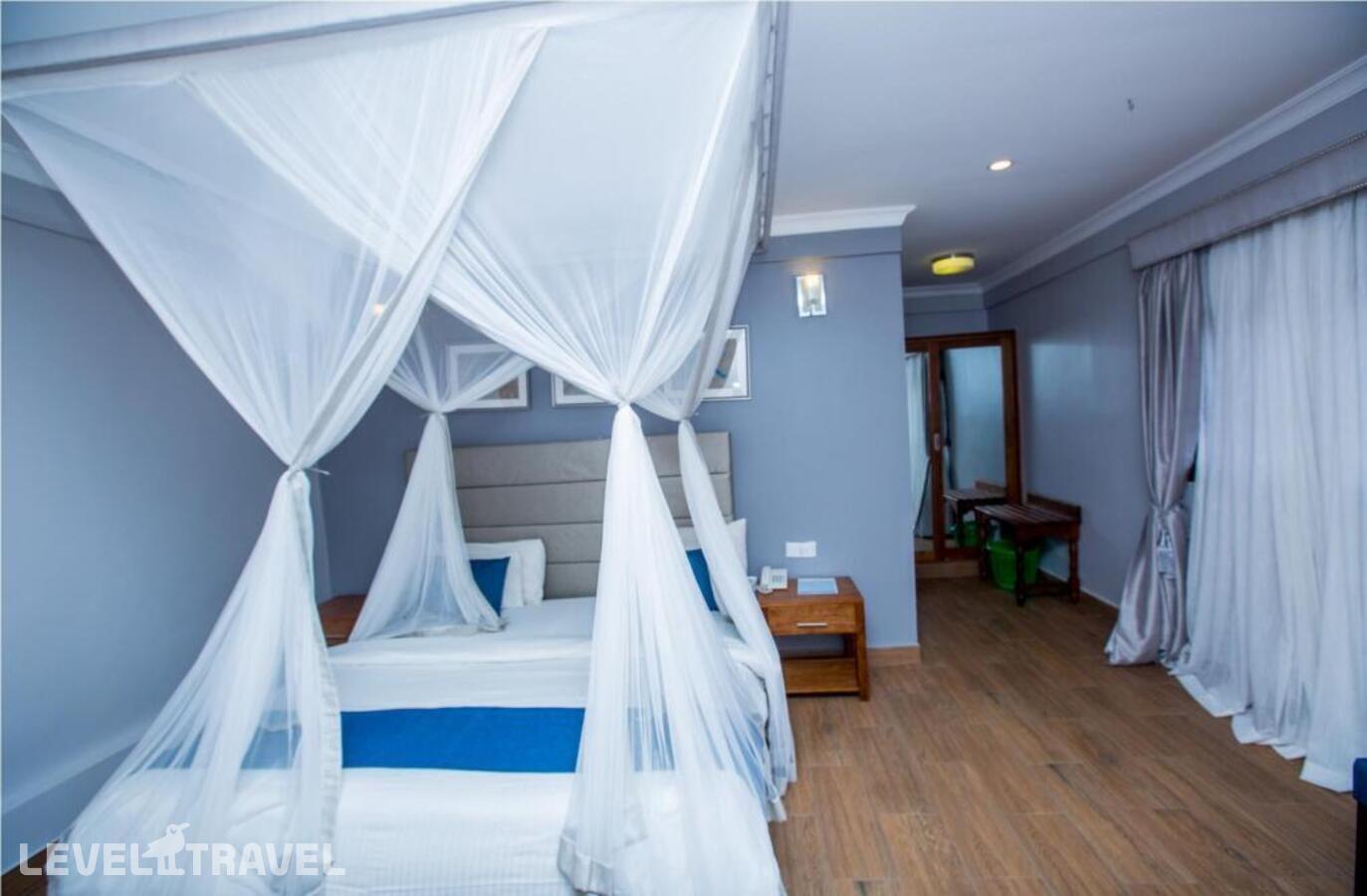 фотографии номера Делюкс отеля Jangwani Sea Breeze Resort в Танзания(Дар-эс-Салам) - фото №1