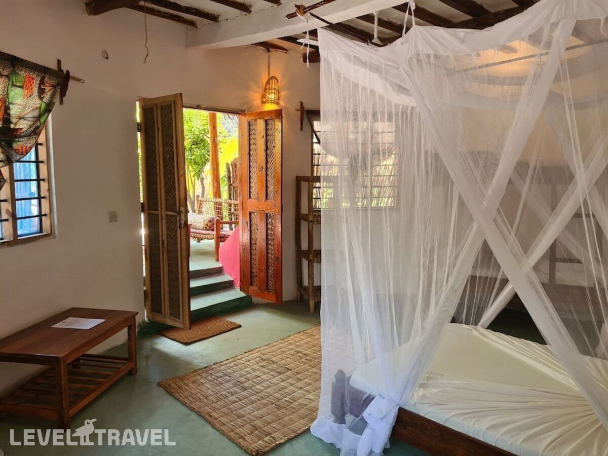 фотографии номера Стандартный номер отеля Evergreen Bungalows в Танзания(Донгве Бич) - фото №2