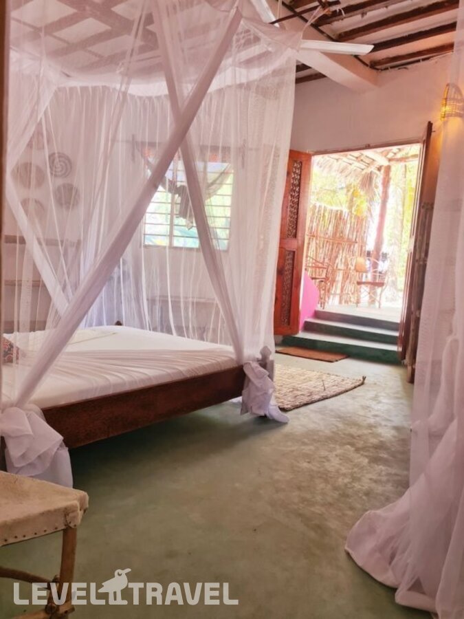 фотографии номера Стандартный номер отеля Evergreen Bungalows в Танзания(Донгве Бич) - фото №4