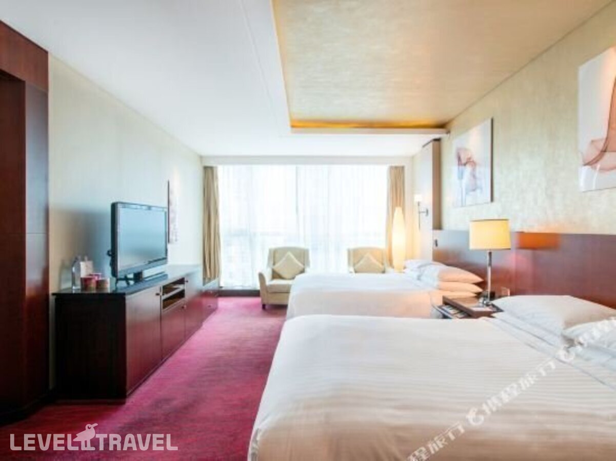 фотографии номера Номер Бизнес отеля Beijing Marriott Hotel Northeast в Китай(Пекин) - фото №1