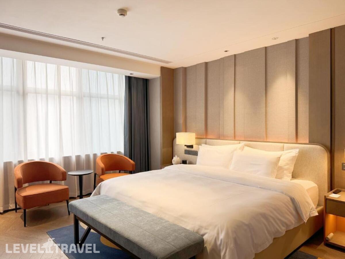 фотографии номера Семейный люкс отеля Baiyun Hotel Guangzhou в Китай(Гуанчжоу) - фото №1