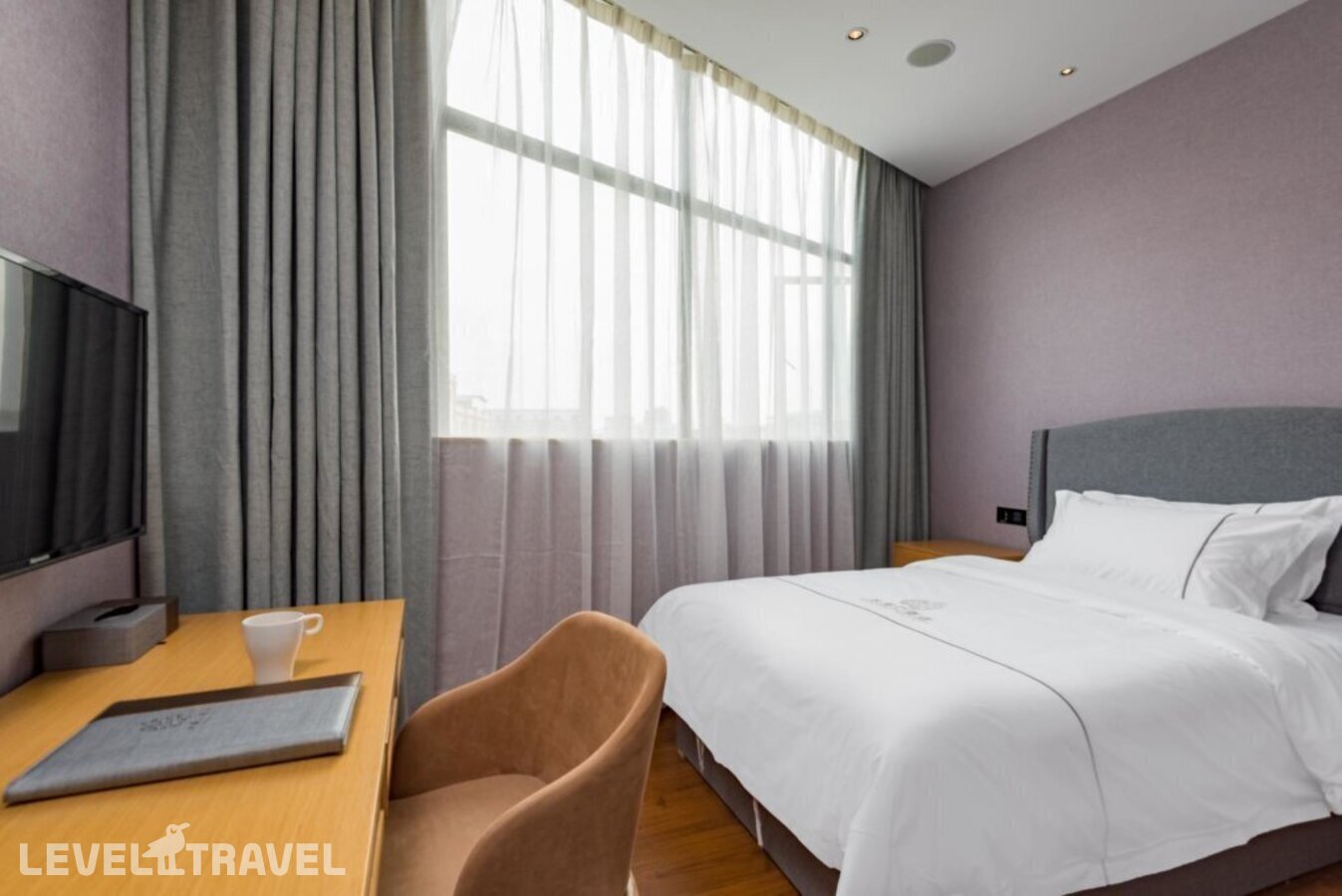 фотографии номера Стандартный номер отеля Guangzhou Mustin Hotel в Китай(Гуанчжоу) - фото №1