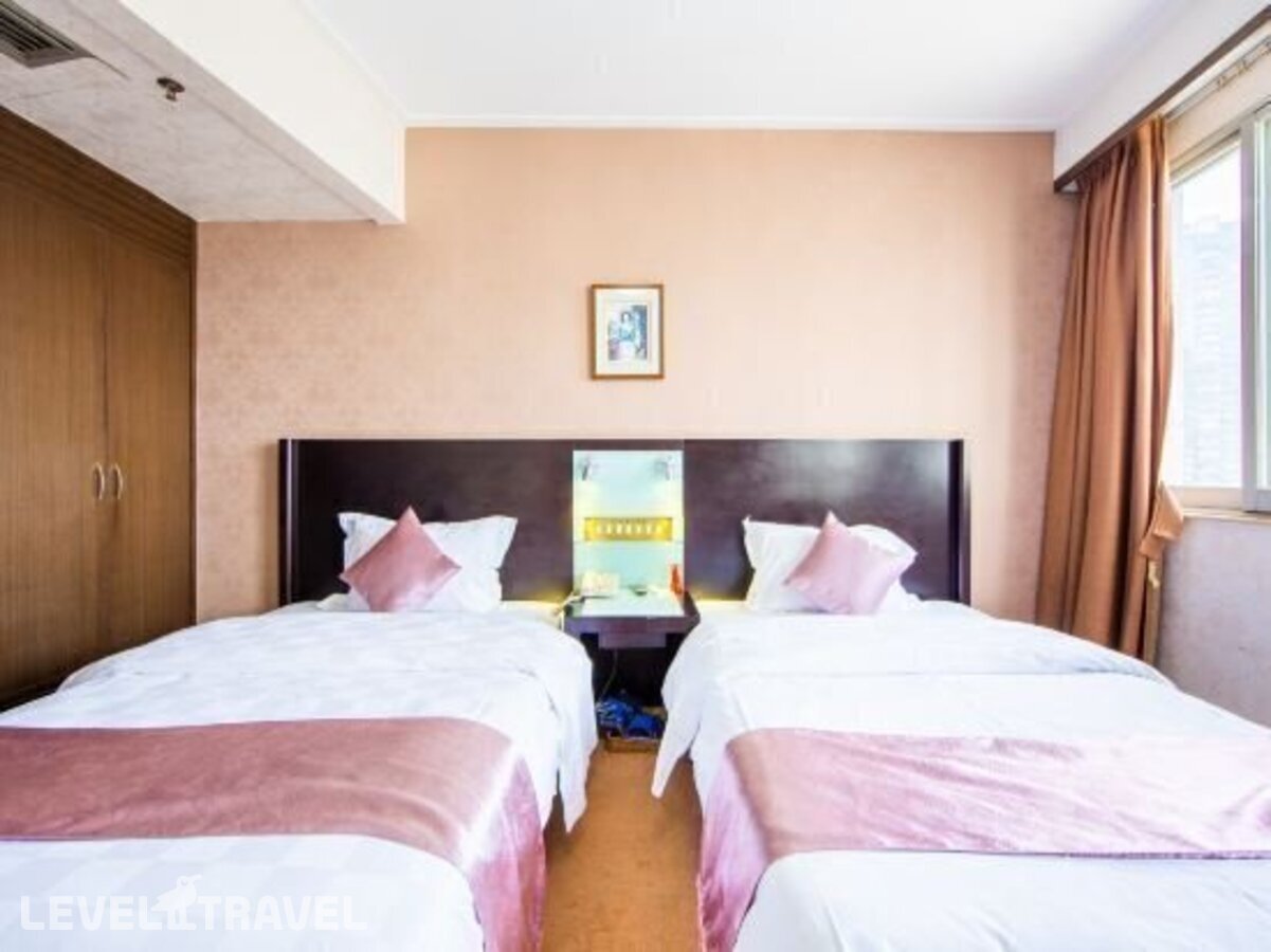 фотографии номера Делюкс отеля Xinhua Hotel в Китай(Гуанчжоу) - фото №5