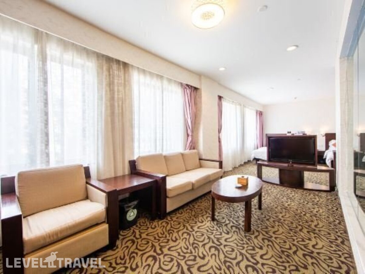 фотографии номера Делюкс отеля Xinhua Hotel в Китай(Гуанчжоу) - фото №12