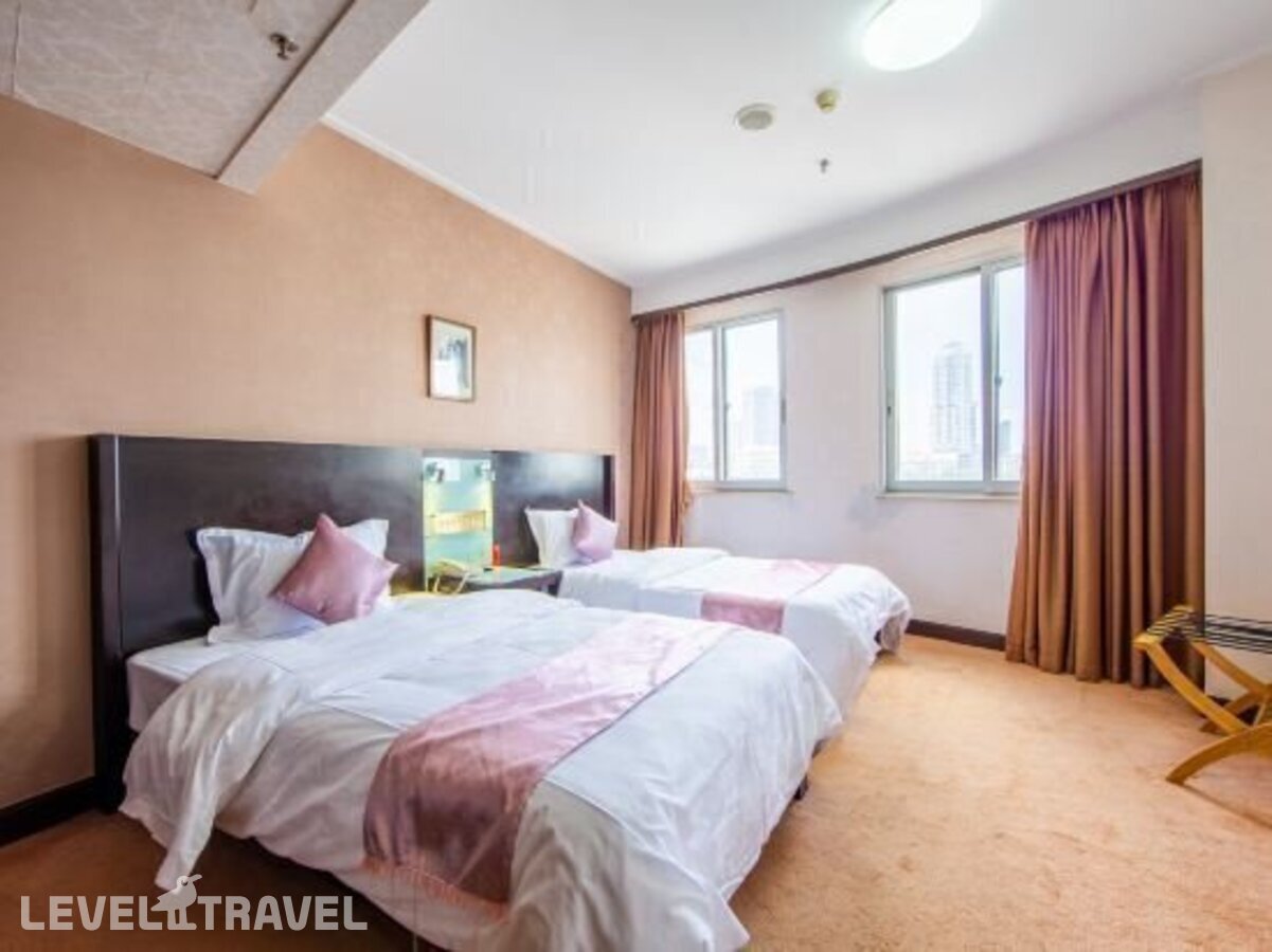 фотографии номера Делюкс отеля Xinhua Hotel в Китай(Гуанчжоу) - фото №2