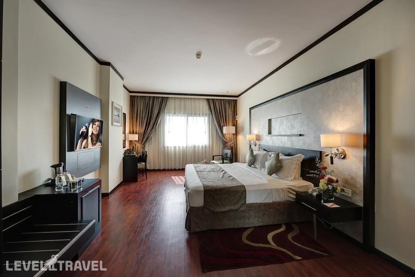 фотографии номера Делюкс отеля Grandeur Hotel Dubai в ОАЭ(Аль Барша) - фото №1