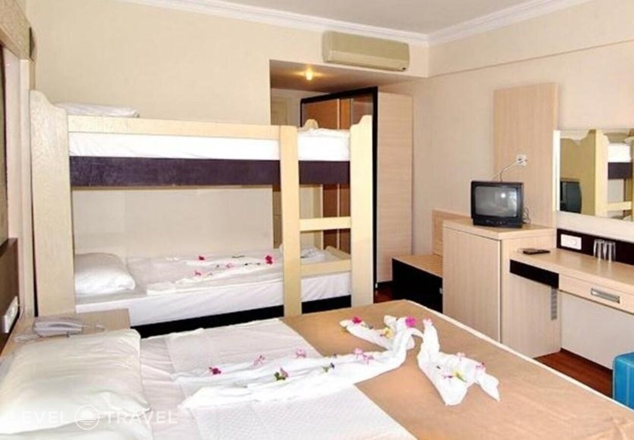фотографии номера Семейный номер отеля Aperion Beach Hotel в Турция(Кызылот) - фото №1