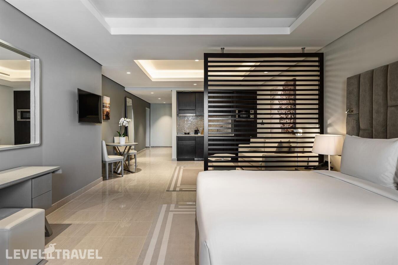 фотографии номера Студия делюкс Skyline отеля Wyndham Residences The Palm в ОАЭ(Дубай Пальма) - фото №1
