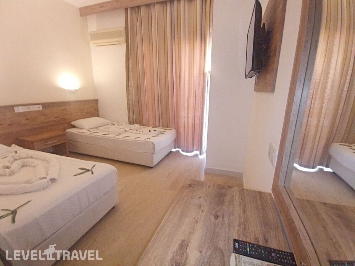 фотографии номера Трехместный номер отеля Park Avrupa Hotel в Турция(Кемер - центр) - фото №12
