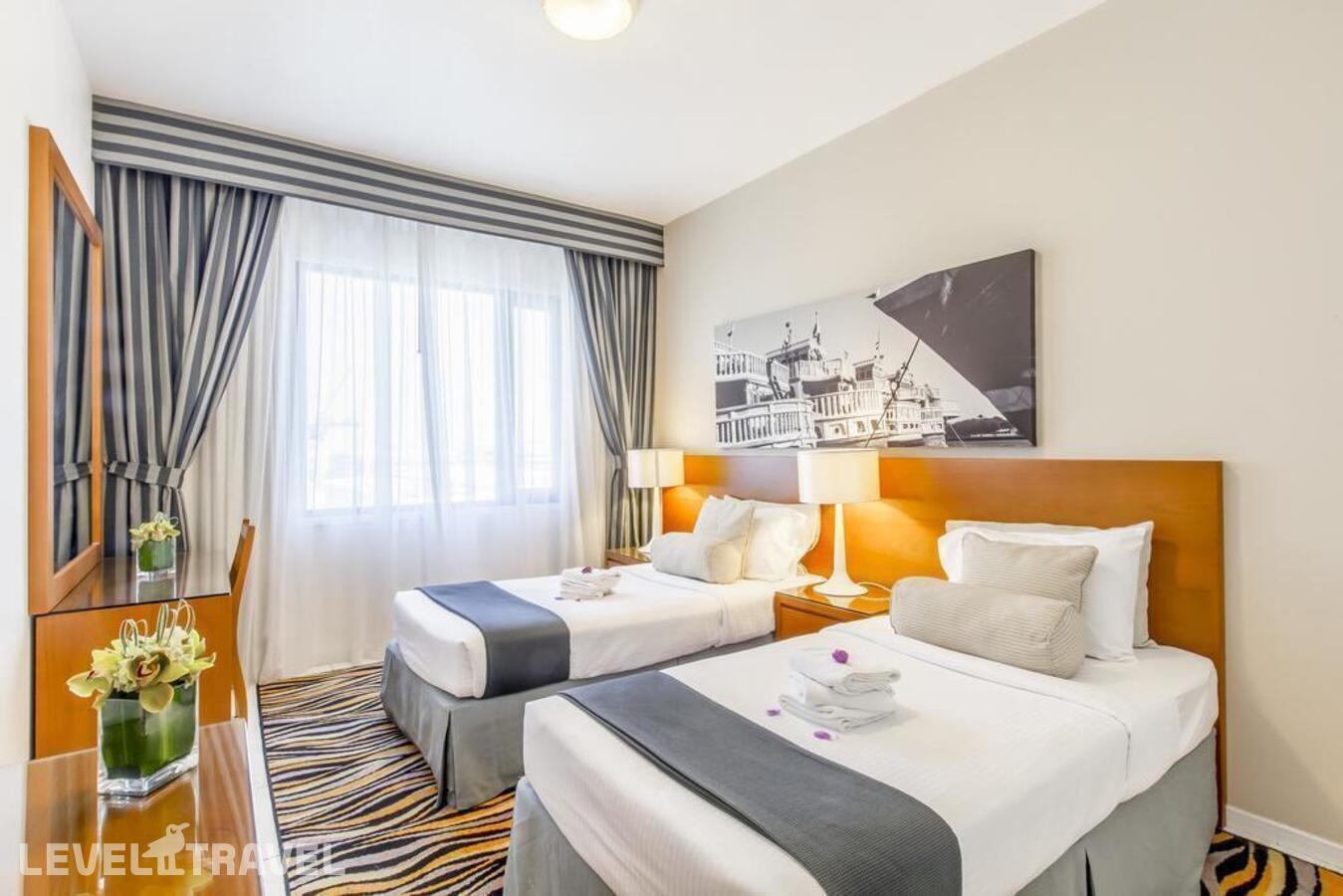 фотографии номера Апартаменты делюкс (2 спальни) отеля Golden Sands Hotel Apartments в ОАЭ(Бар Дубай) - фото №1