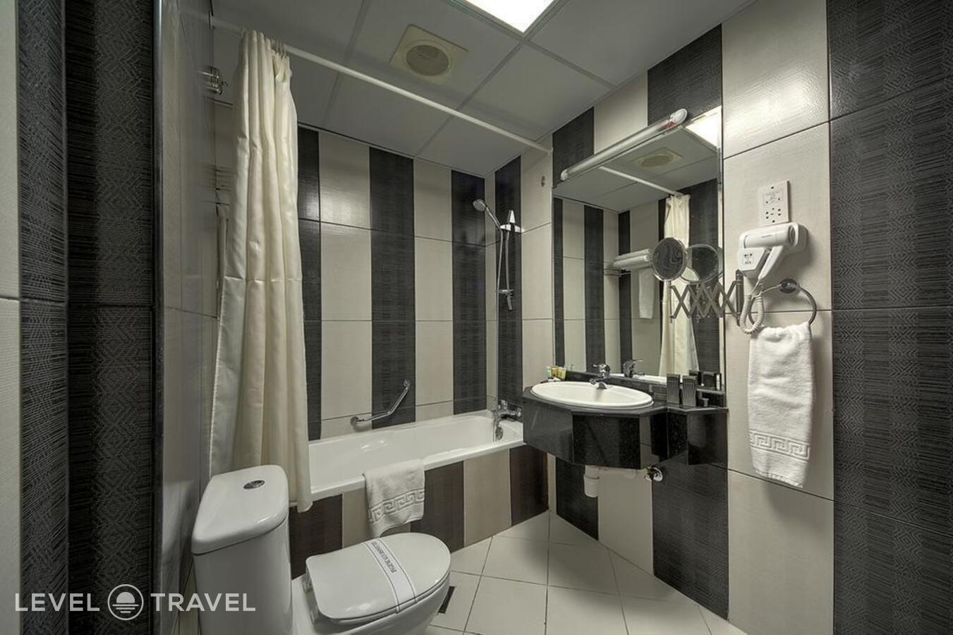 фотографии номера Стандартный номер отеля Vendome Plaza Hotel (Ex. Delmon Palace Hotel) в ОАЭ(Дейра) - фото №3