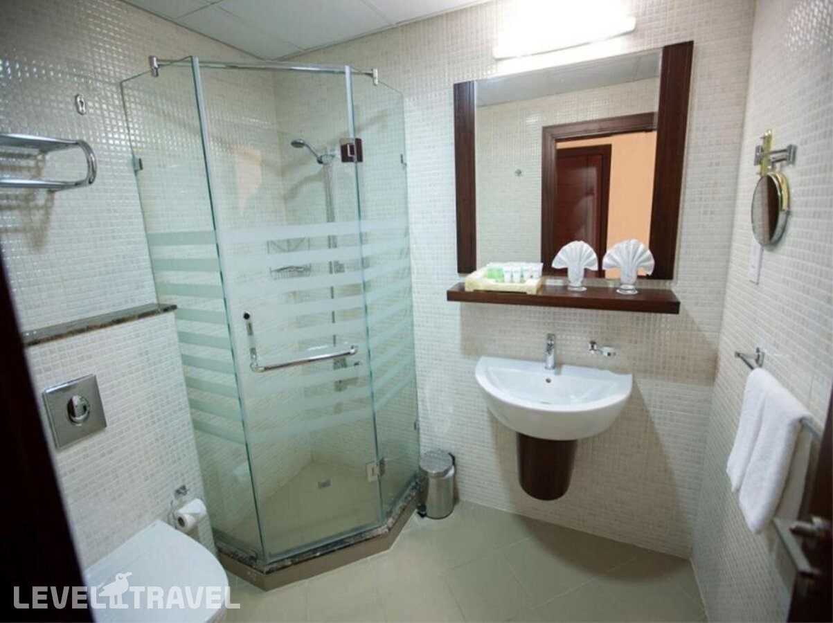фотографии номера Студия делюкс отеля Xclusive Maples Hotel Apartments в ОАЭ(Бар Дубай) - фото №18