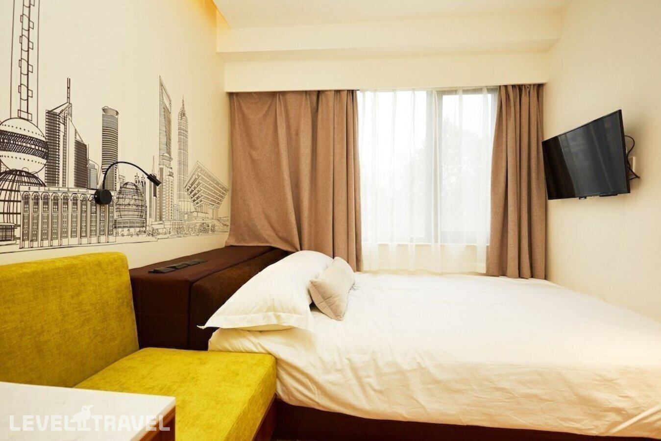 фотографии номера Улучшенный семейный отеля Shanghai Meego Youth Hostel в Китай(Шанхай) - фото №3