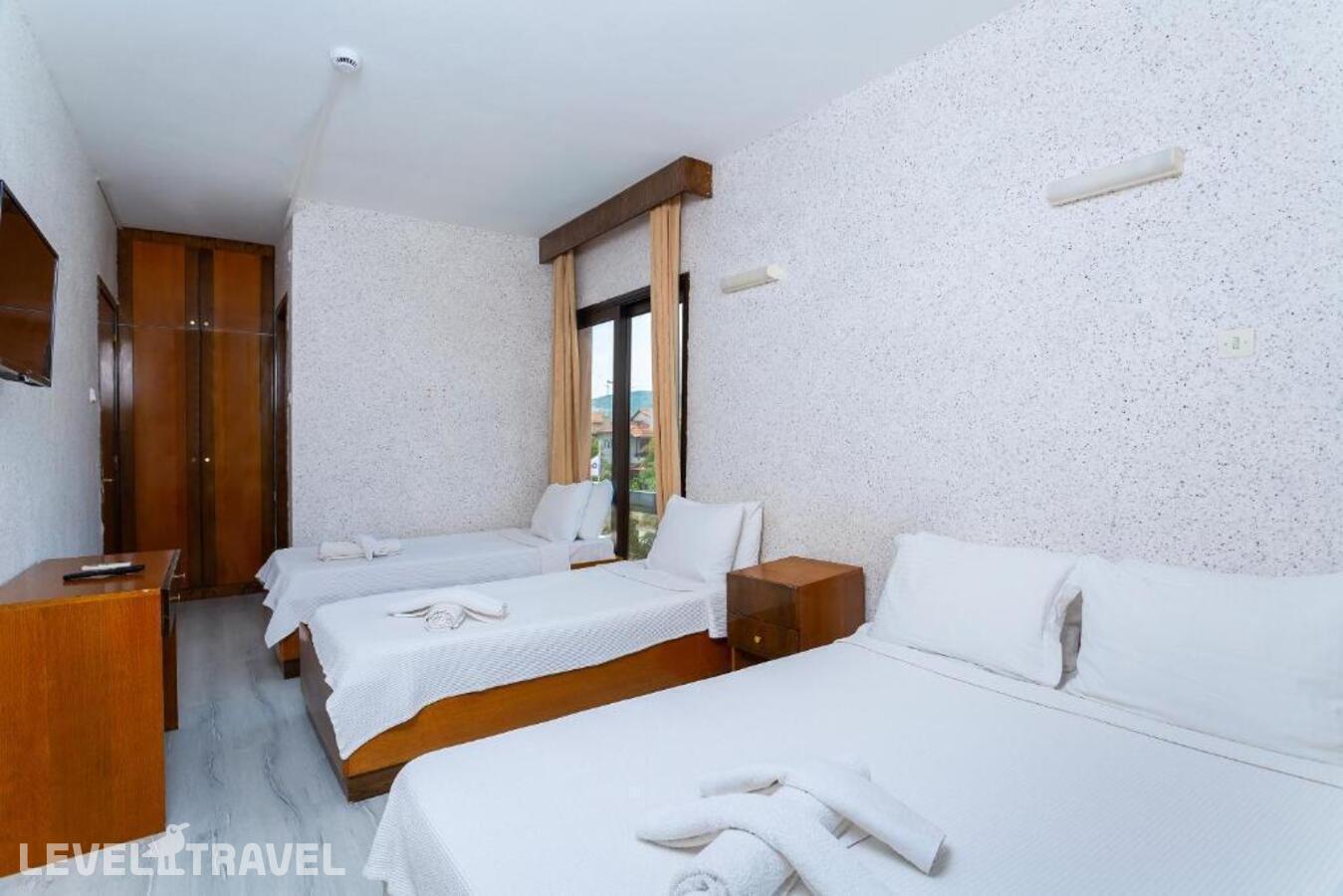 фотографии номера Четырехместный номер отеля Otel Kabasakal в Турция(Чешме) - фото №2
