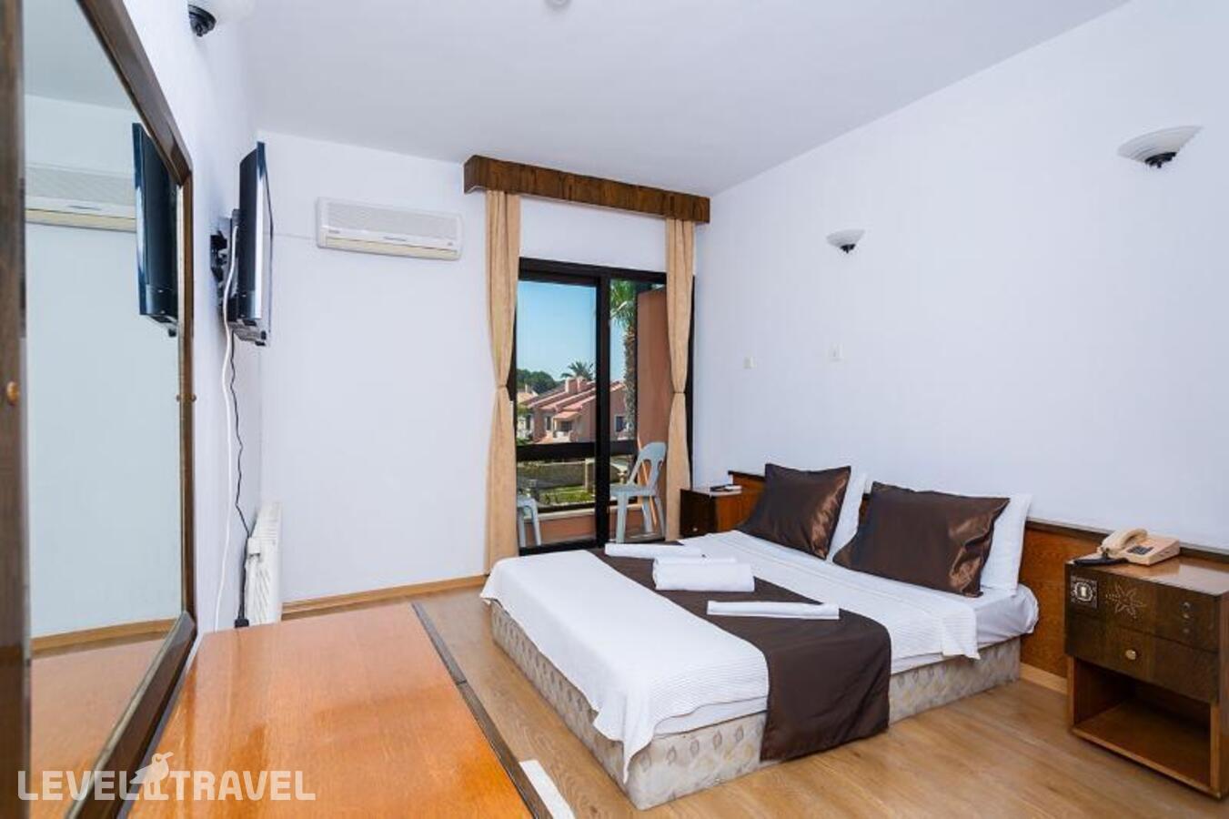 фотографии номера Стандартный номер отеля Otel Kabasakal в Турция(Чешме) - фото №1