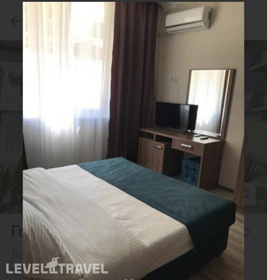 фотографии номера Четырехместный с балконом отеля Гостевой Дом Guest House Family в Россия(Лазаревское) - фото №1