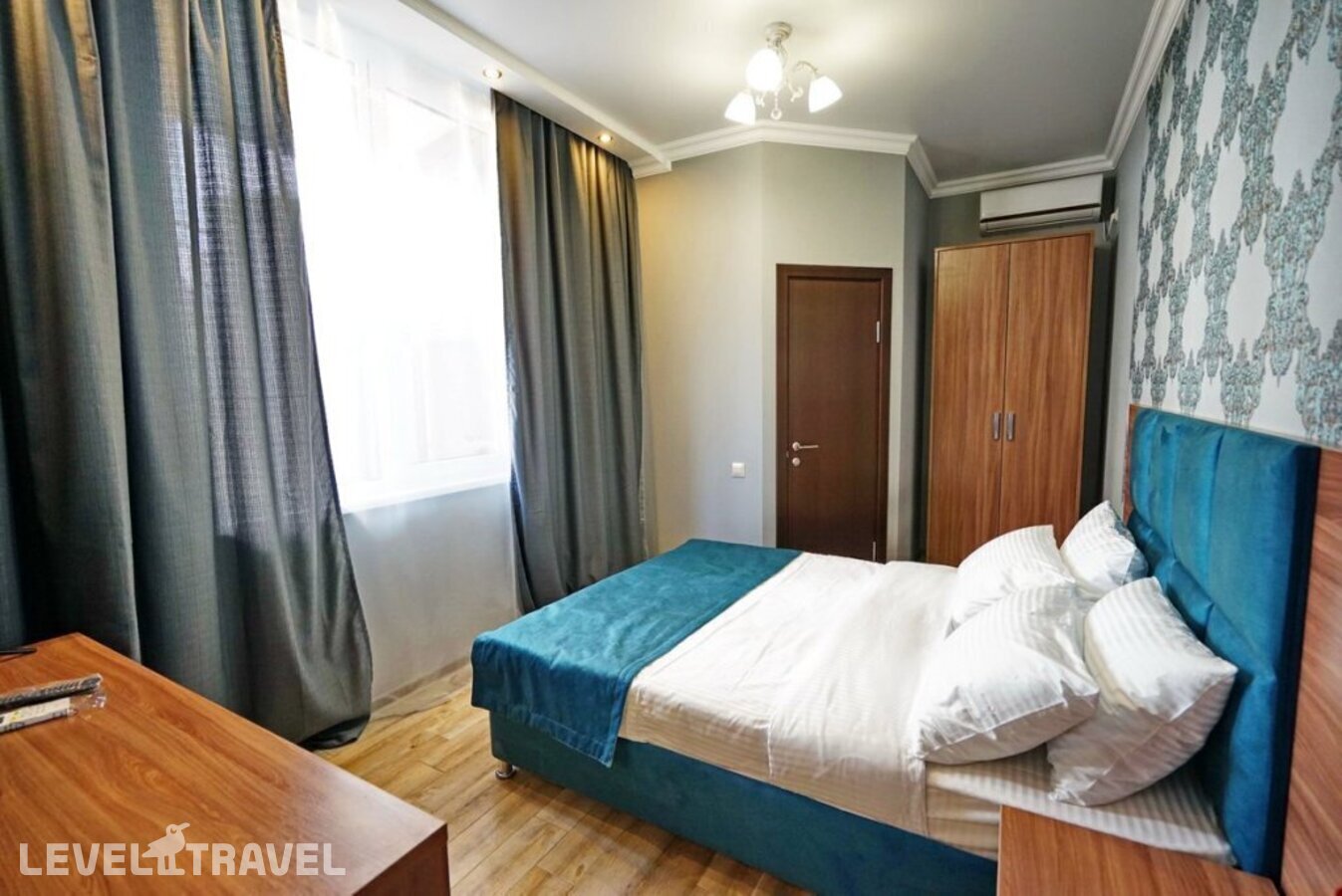 фотографии номера Четырехместный с балконом отеля Гостевой Дом Guest House Family в Россия(Лазаревское) - фото №8