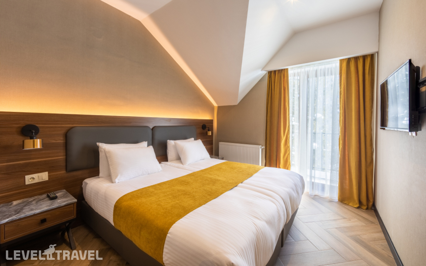 фотографии номера Семейный люкс с балконом отеля Отель Komorebi Bakuriani Resort в Грузия(Бакуриани) - фото №1