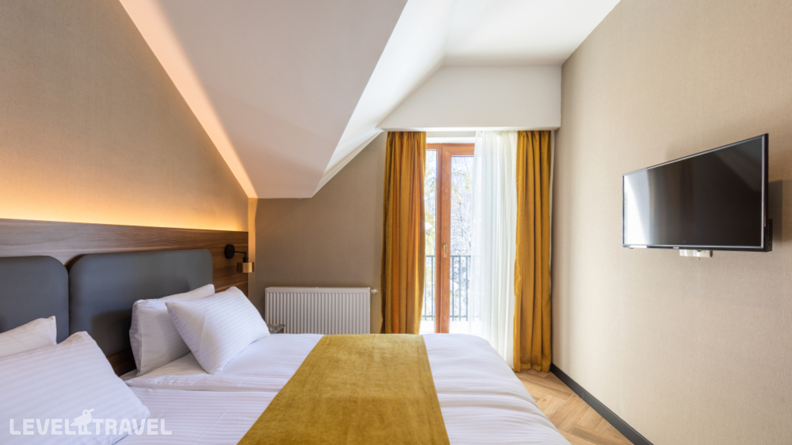 фотографии номера Семейный люкс с балконом отеля Отель Komorebi Bakuriani Resort в Грузия(Бакуриани) - фото №2