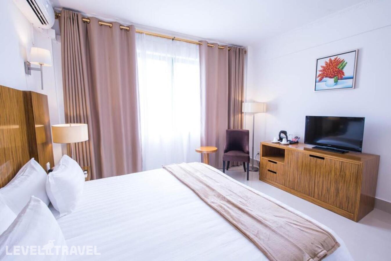 фотографии номера Делюкс отеля Palms Hotel в Маврикий(Западное побережье) - фото №1