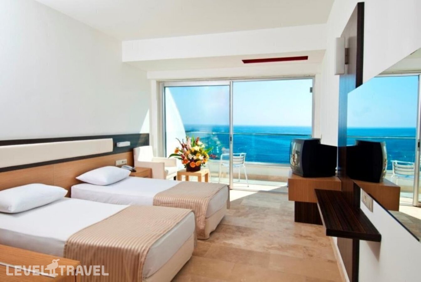 фотографии номера Стандартный с балконом и видом на море отеля Yalihan Una Hotel в Турция(Авсаллар) - фото №3