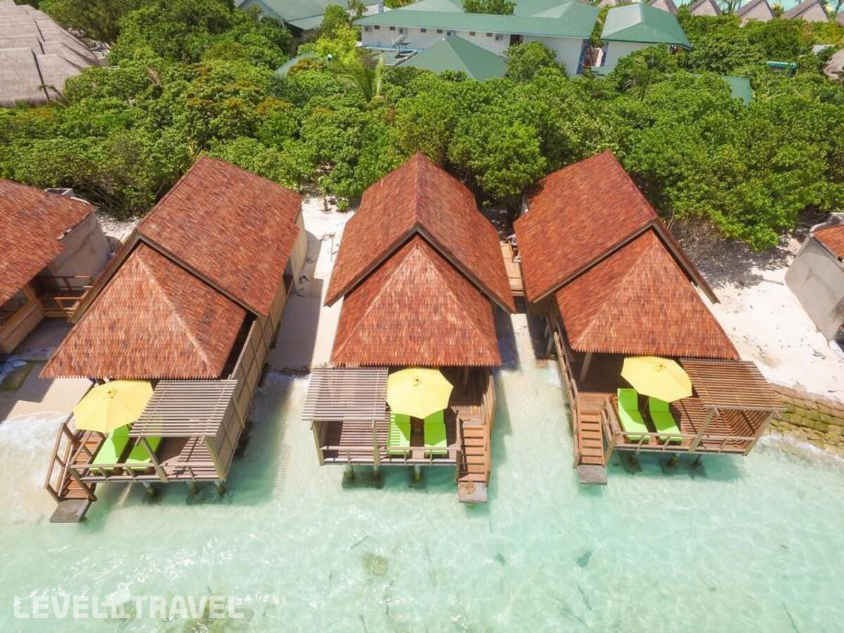 фотографии номера Вилла частично над водой отеля Dhigufaru Island Resort в Мальдивы(Баа Атолл) - фото №6