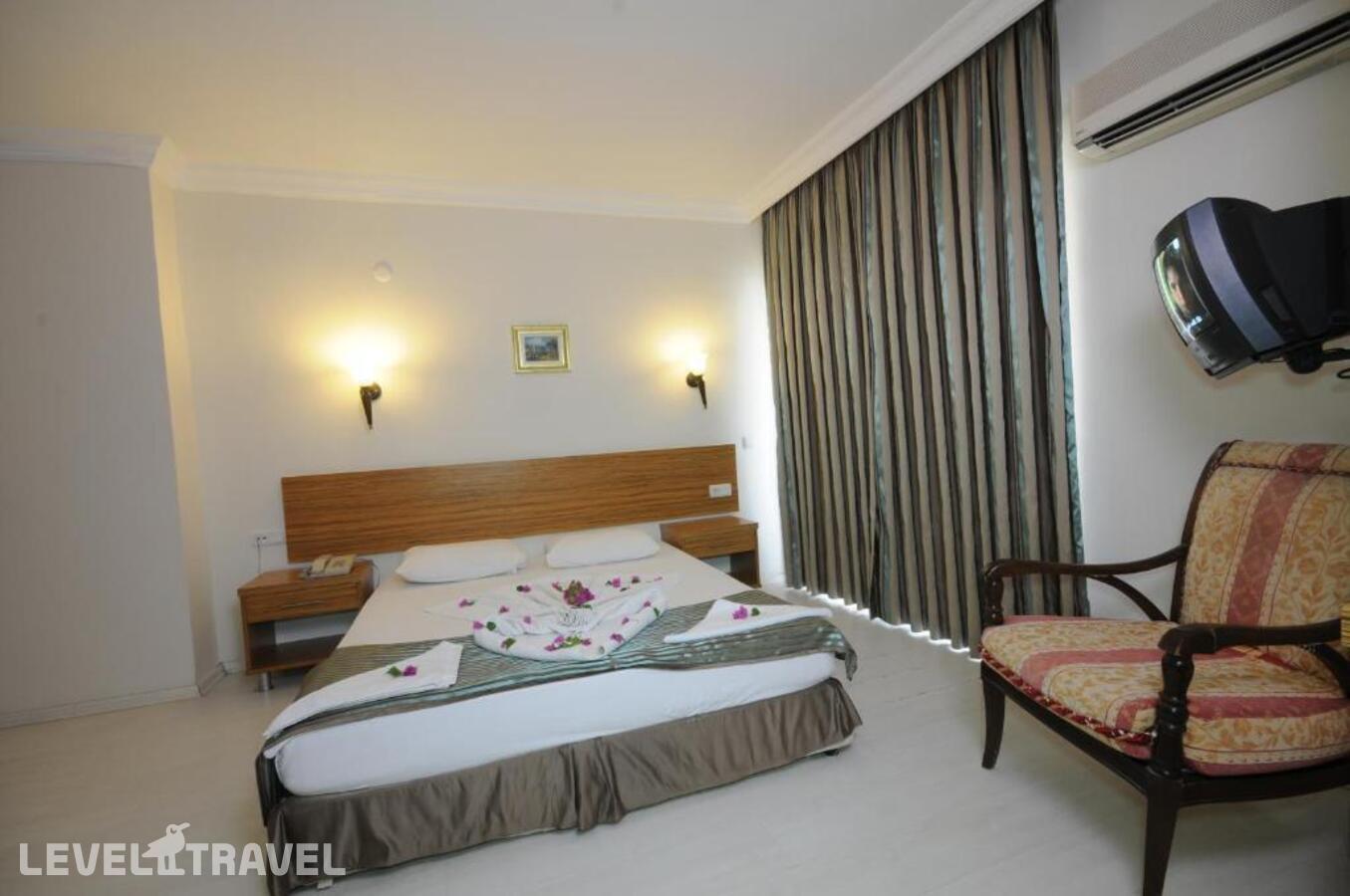 фотографии номера Одноместный номер отеля Mert Seaside Hotel (Adults Only 16+) (Ex. Cle Seaside Hotel, Ex. Armar Seaside) в Турция(Мармарис - центр) - фото №2