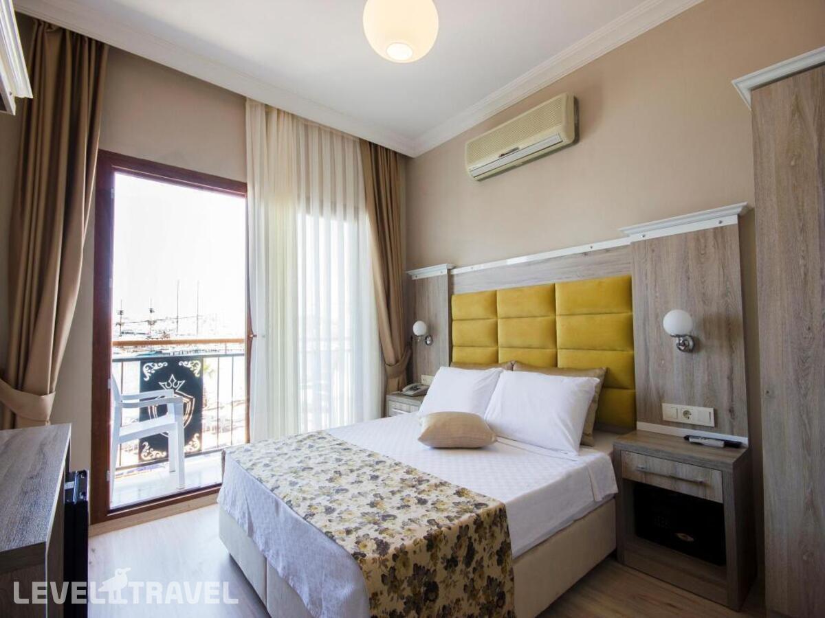 фотографии номера Семейный с видом на море отеля Akkan Beach Hotel в Турция(Бодрум - центр) - фото №1