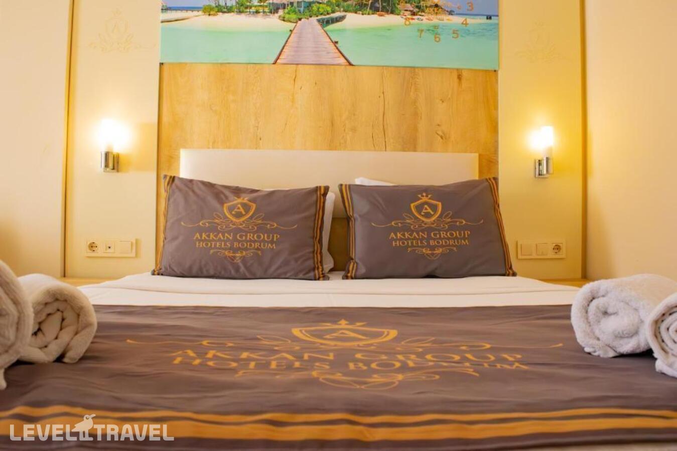 фотографии номера Семейный с видом на море отеля Akkan Beach Hotel в Турция(Бодрум - центр) - фото №3