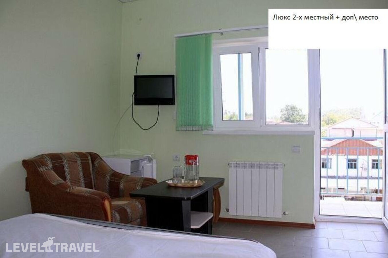 фотографии номера Стандартный с балконом отеля Гостевой Дом Рузана в Россия(Вардане) - фото №3