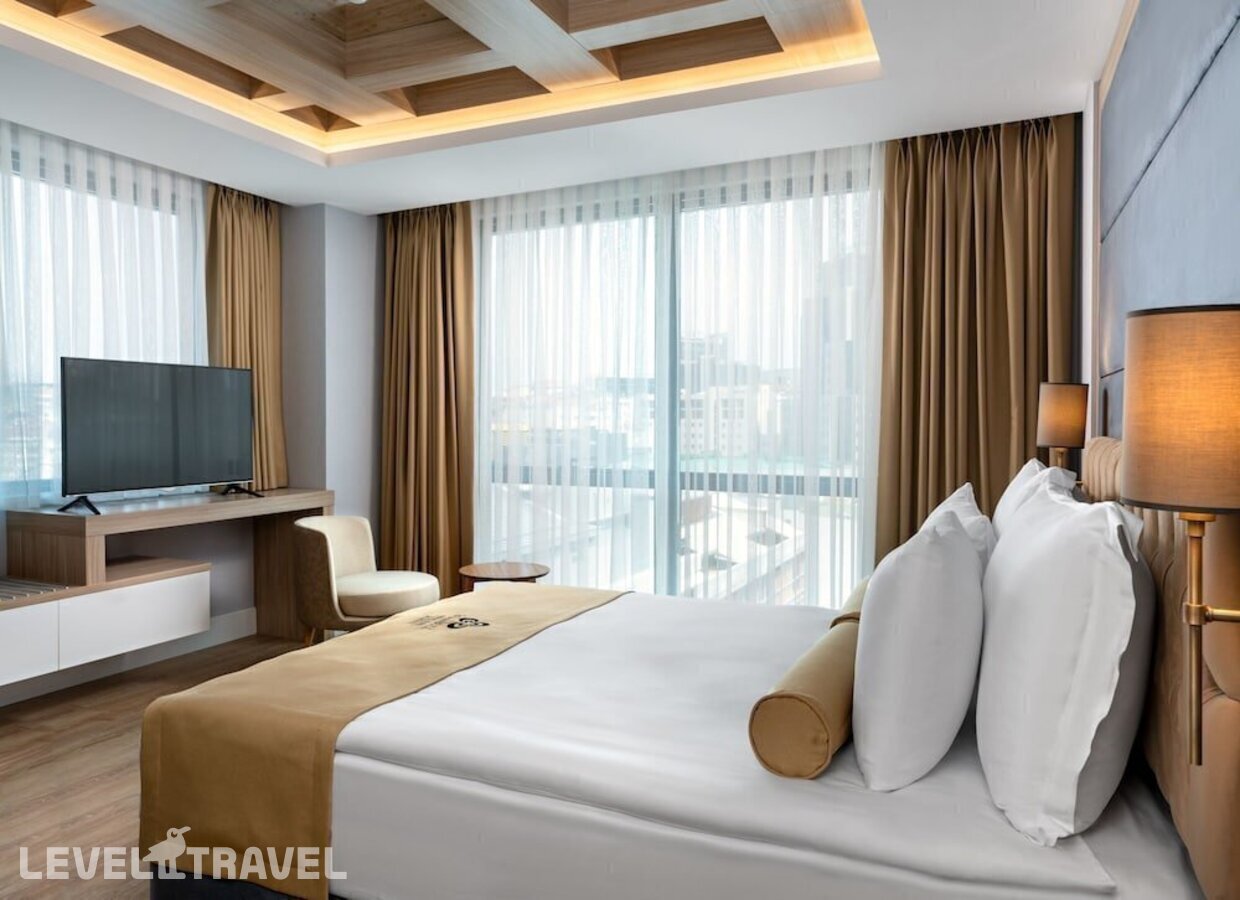 фотографии номера Делюкс с видом на город отеля Febor İstanbul Bomonti Hotel & Spa в Турция(Бомонти) - фото №4