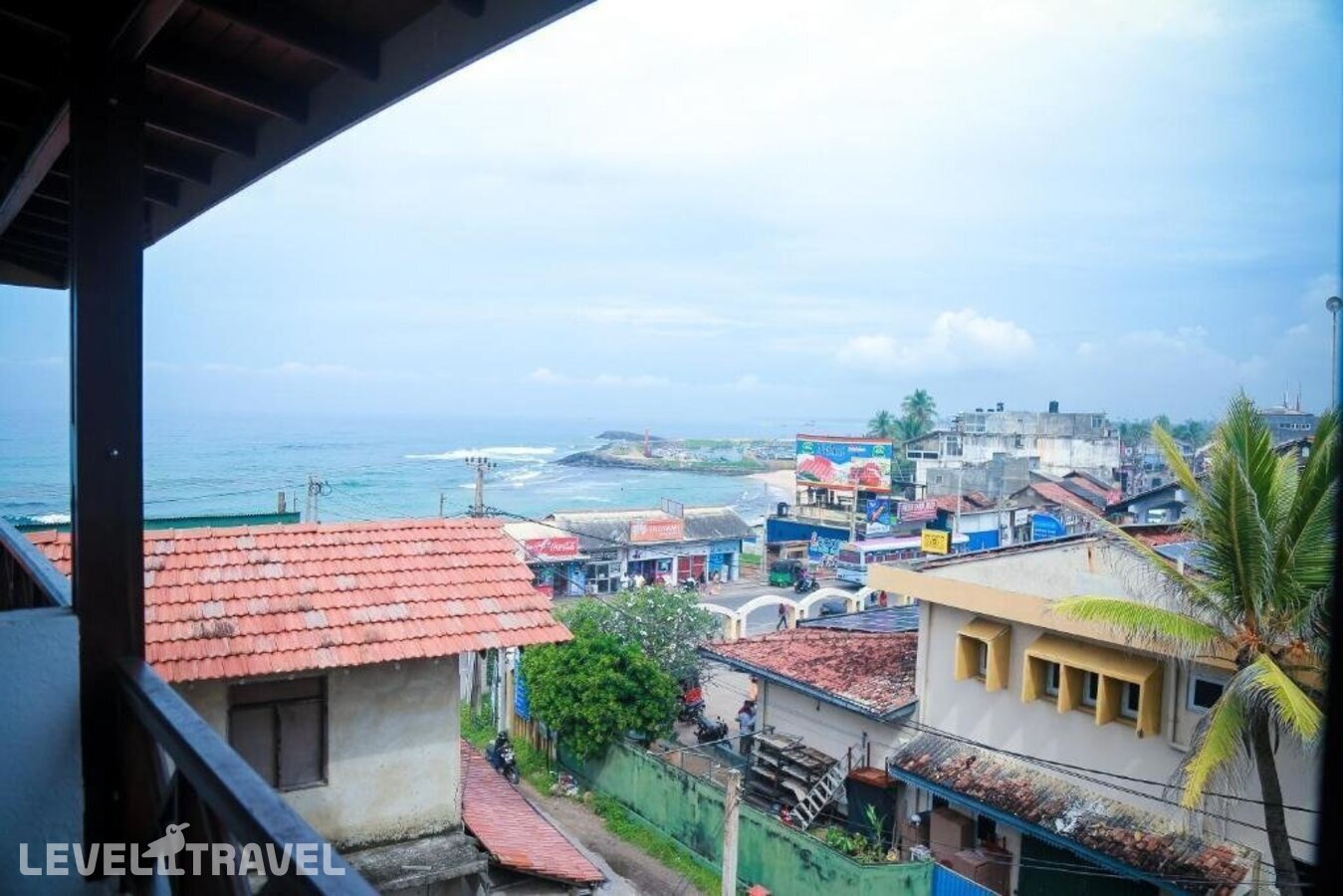 фотографии номера Трехместный делюкс с видом на море отеля Cozy Sea View Inn в Шри-Ланка(Хиккадува) - фото №6