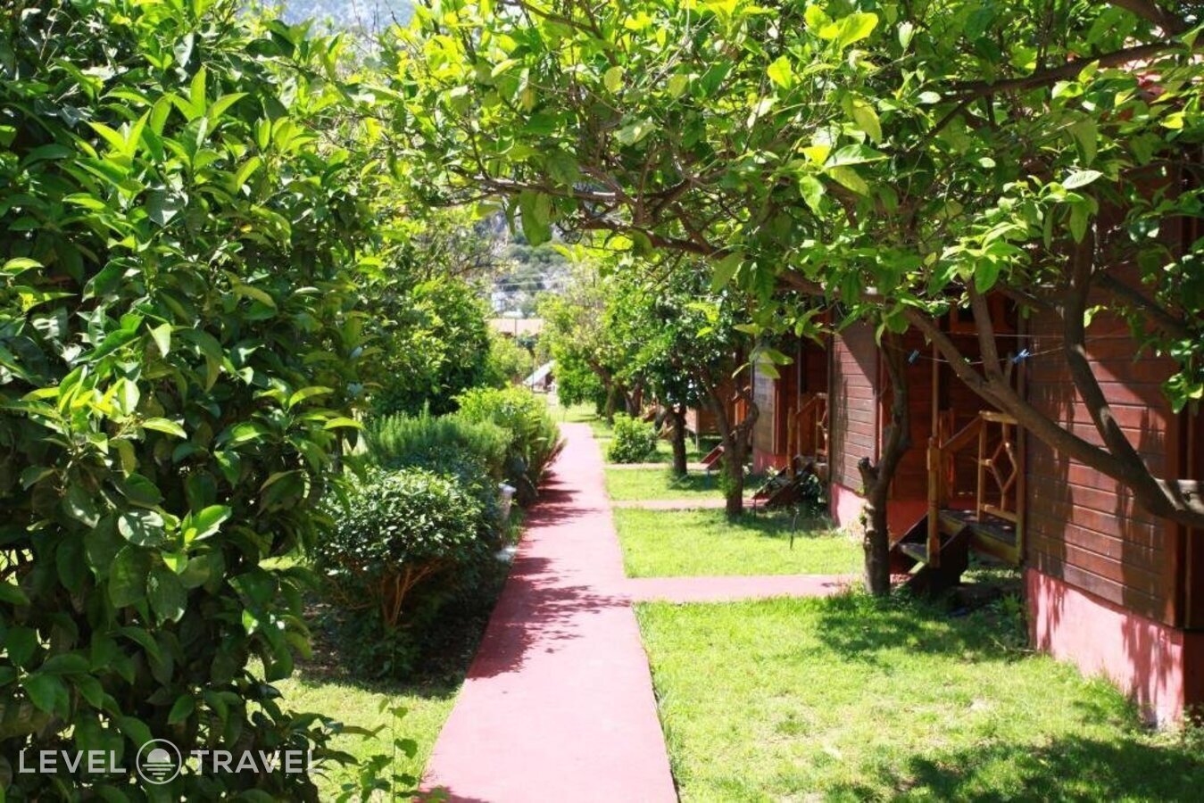 фотографии номера Трехместное бунгало отеля Baris Pension & Bungalows в Турция(Чиралы) - фото №4
