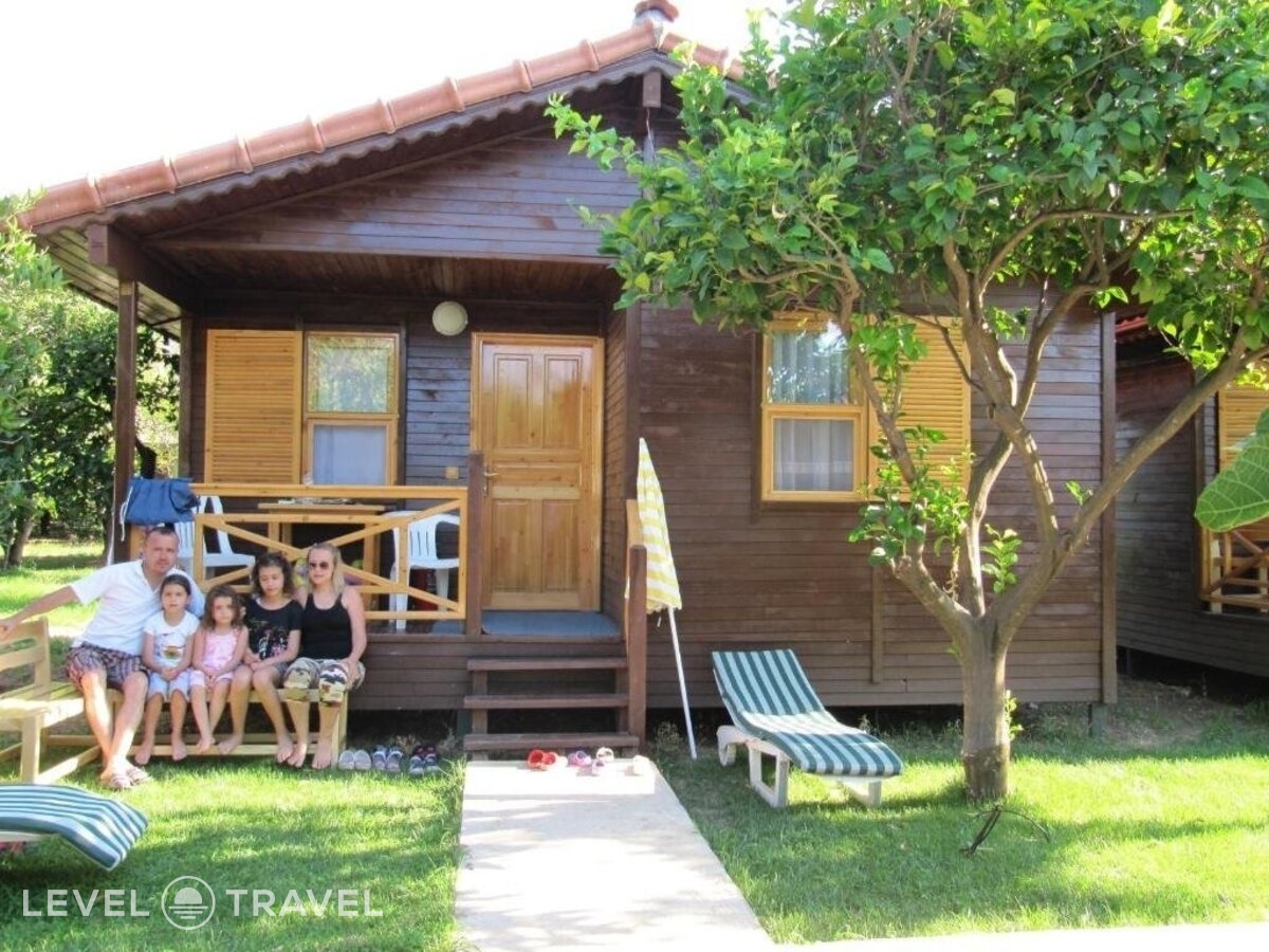 фотографии номера Бунгало семейное отеля Baris Pension & Bungalows в Турция(Чиралы) - фото №2