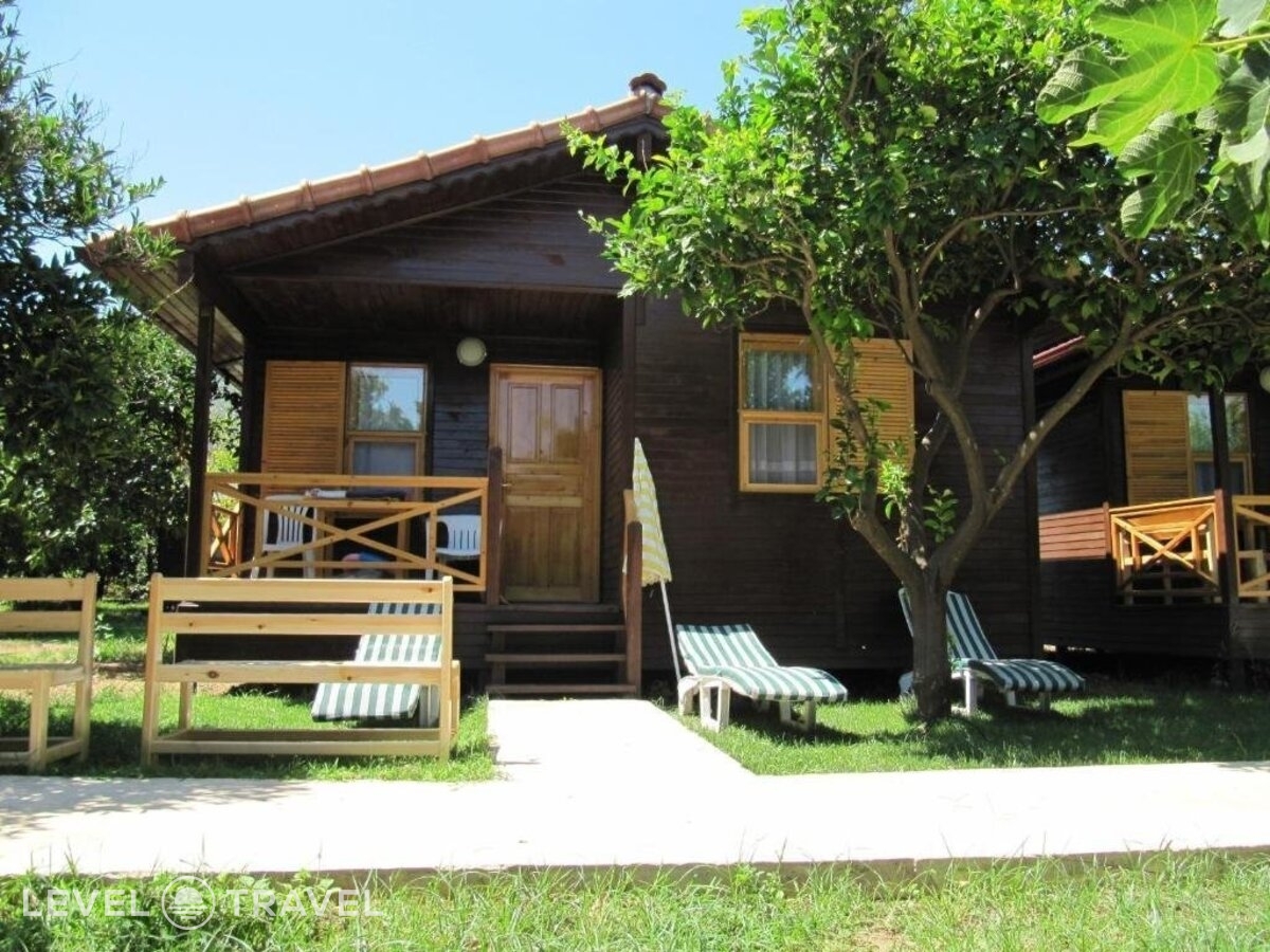 фотографии номера Бунгало семейное отеля Baris Pension & Bungalows в Турция(Чиралы) - фото №1