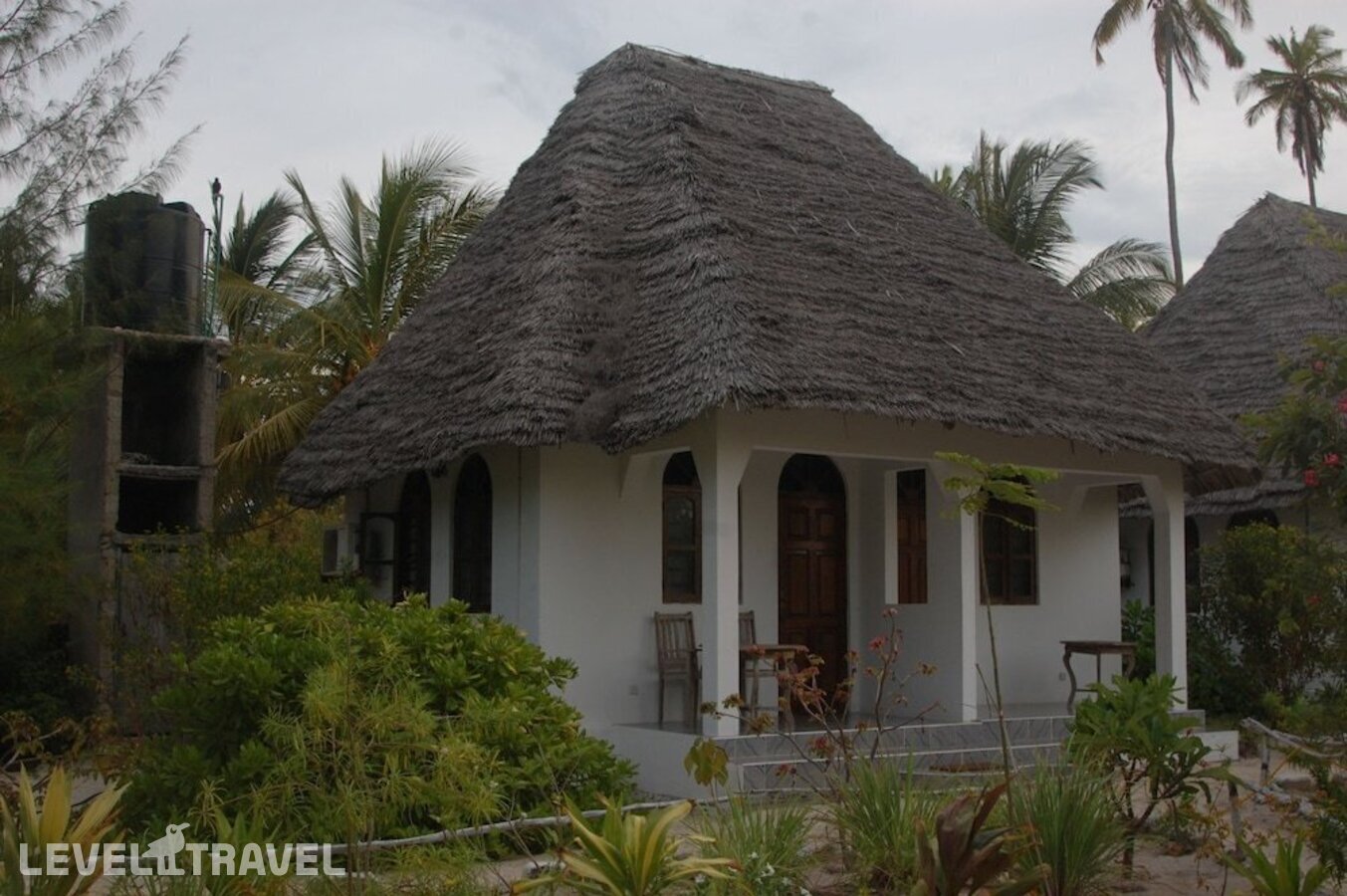 фотографии номера Семейный с видом на море отеля Blue Earth Beach Bungalows в Танзания(Джамбиани) - фото №7