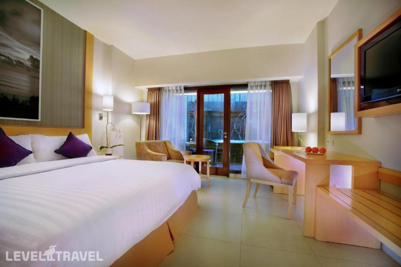 фотографии номера Улучшенный номер отеля Quest Hotel Tuban в Индонезия(Кута) - фото №2
