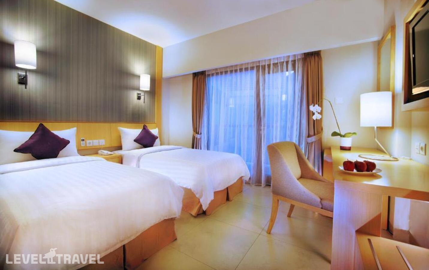 фотографии номера Делюкс с выходом к бассейну отеля Quest Hotel Tuban в Индонезия(Кута) - фото №5