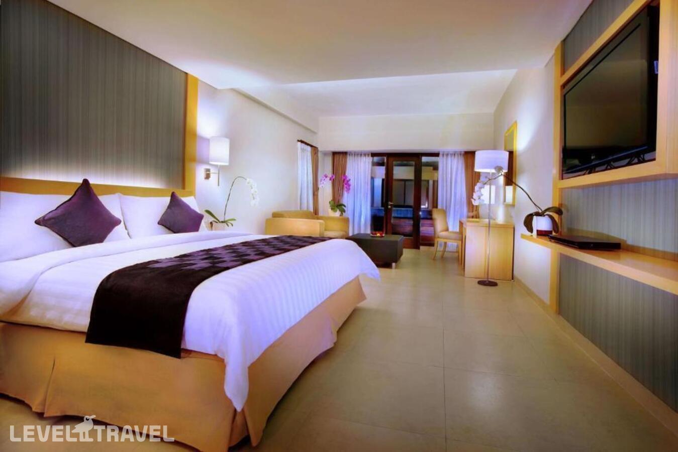 фотографии номера Полулюкс отеля Quest Hotel Tuban в Индонезия(Кута) - фото №6