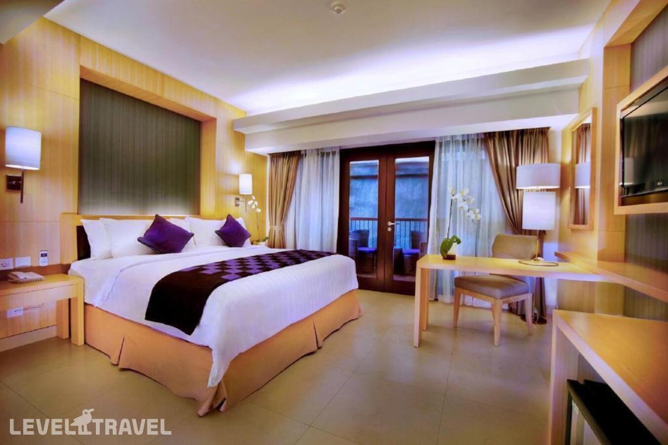 фотографии номера Полулюкс отеля Quest Hotel Tuban в Индонезия(Кута) - фото №4