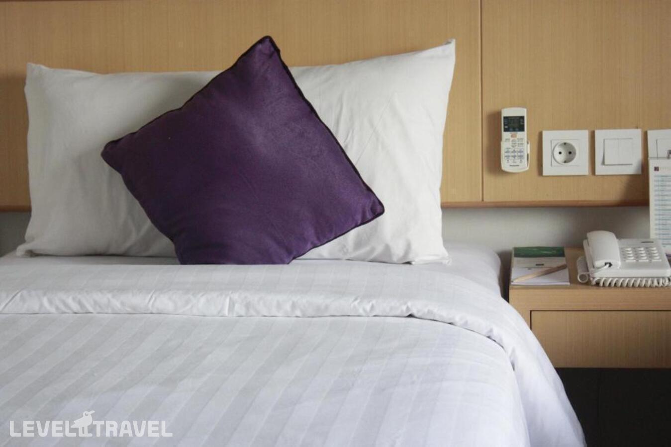 фотографии номера Полулюкс отеля Quest Hotel Tuban в Индонезия(Кута) - фото №7