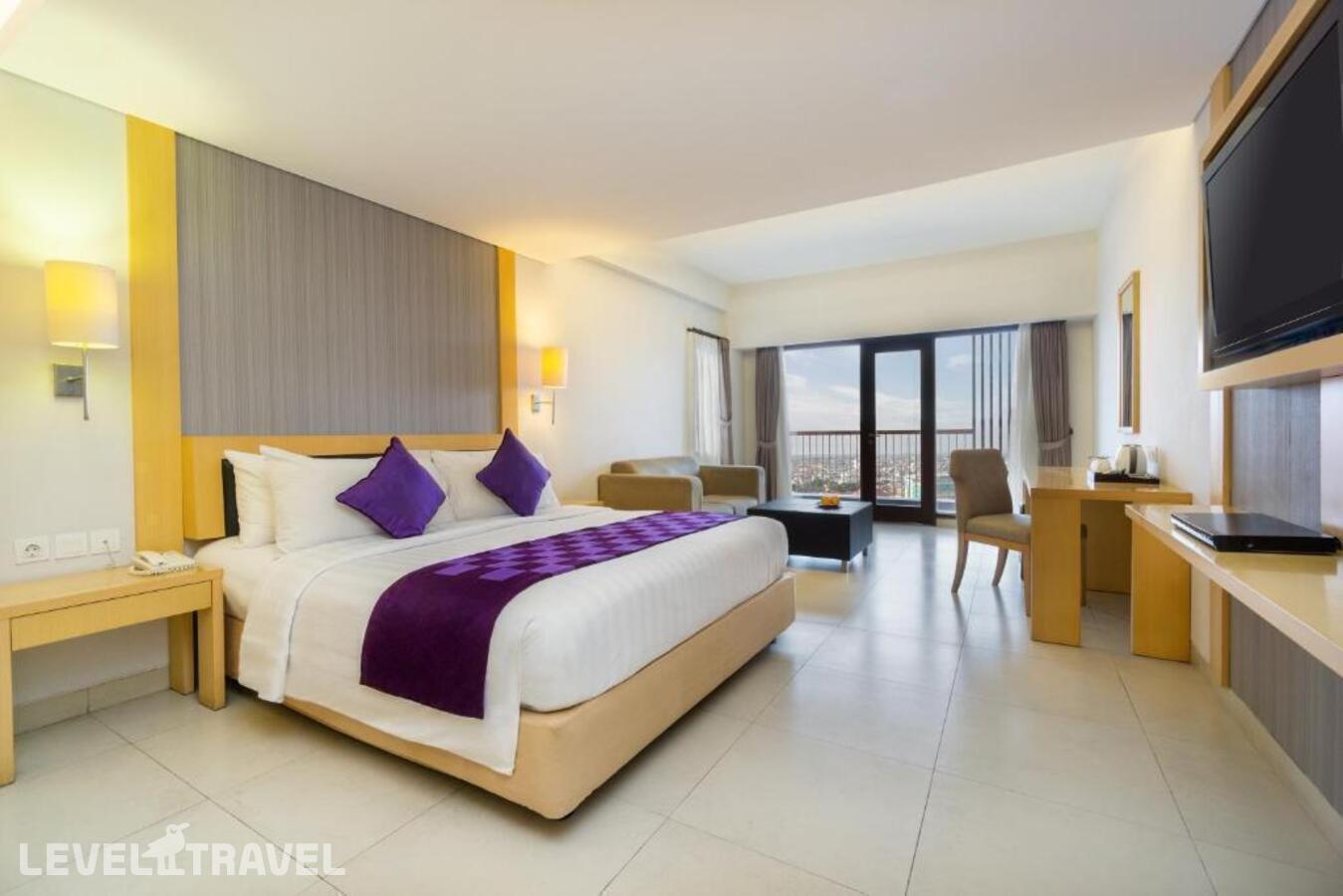 фотографии номера Полулюкс отеля Quest Hotel Tuban в Индонезия(Кута) - фото №1