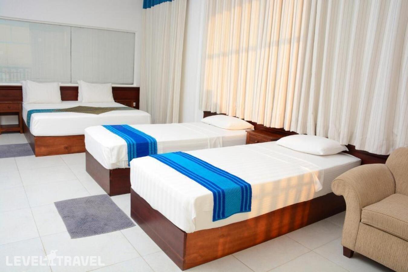 фотографии номера Семейный с джакузи отеля Hikka Bliss (Ex. Ranmal Beach Hotel) в Шри-Ланка(Хиккадува) - фото №1