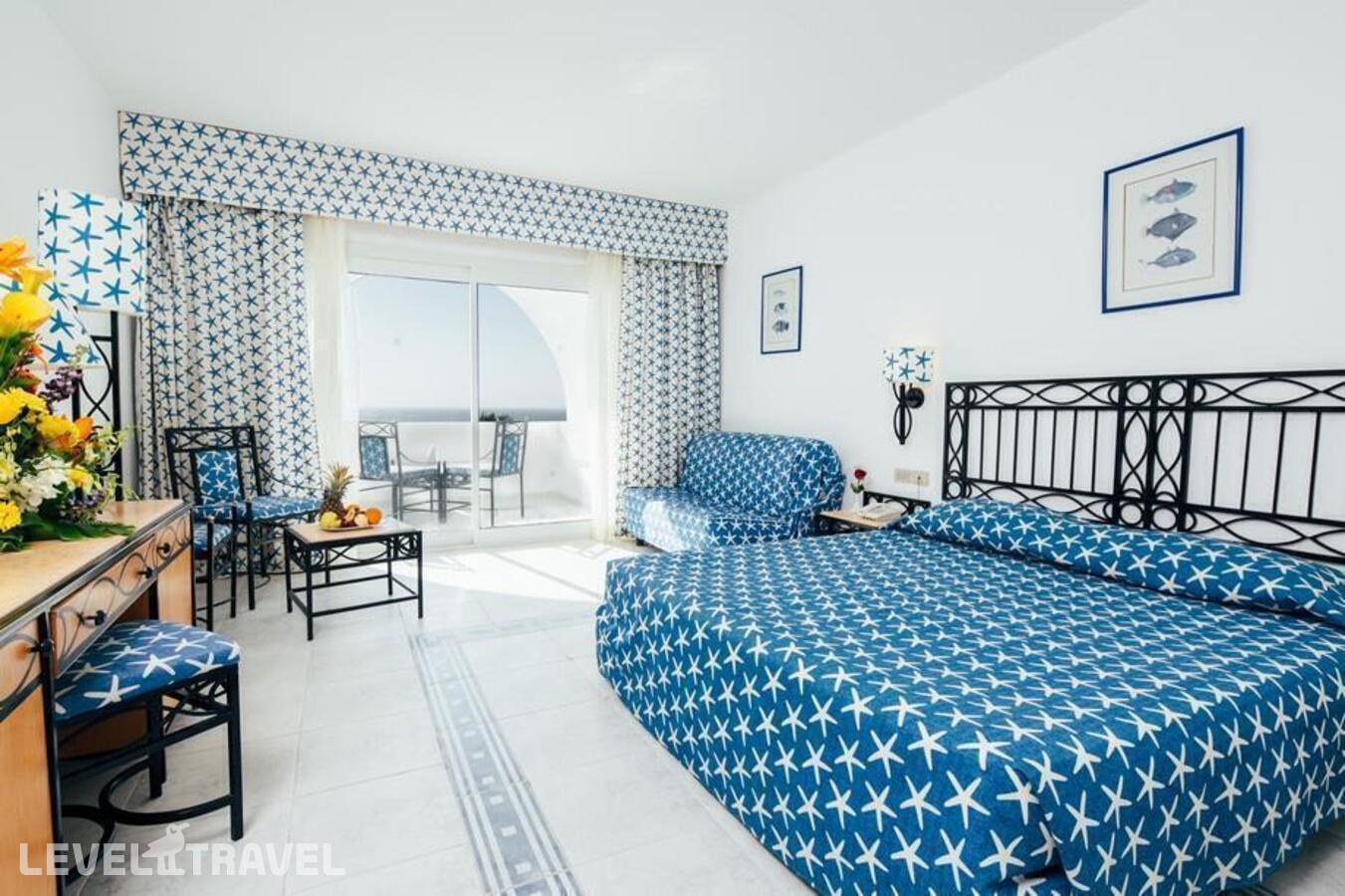 фотографии номера Стандартный с фронтальным видом на пляж отеля Domina Coral Bay Aquamarine Beach в Египет(Корал Бэй) - фото №1