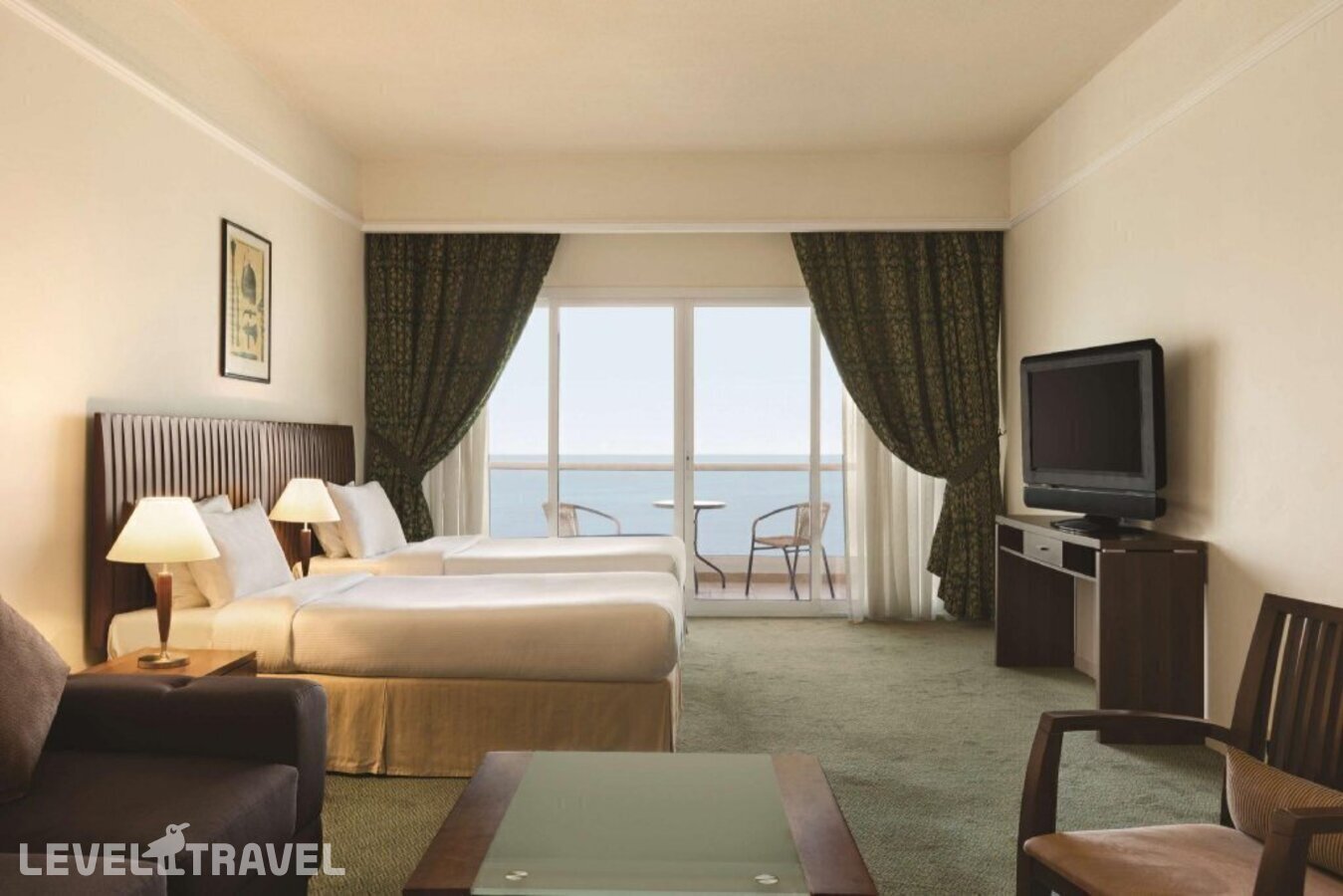 фотографии номера Стандартный (две односпальные кровати) отеля Ramada Beach Hotel Ajman By Wyndham в ОАЭ(Аджман) - фото №5