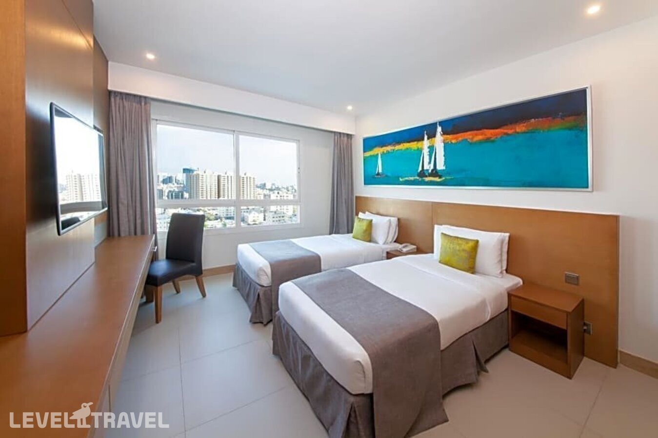 фотографии номера Стандартный (две односпальные кровати) отеля Ramada Beach Hotel Ajman By Wyndham в ОАЭ(Аджман) - фото №6