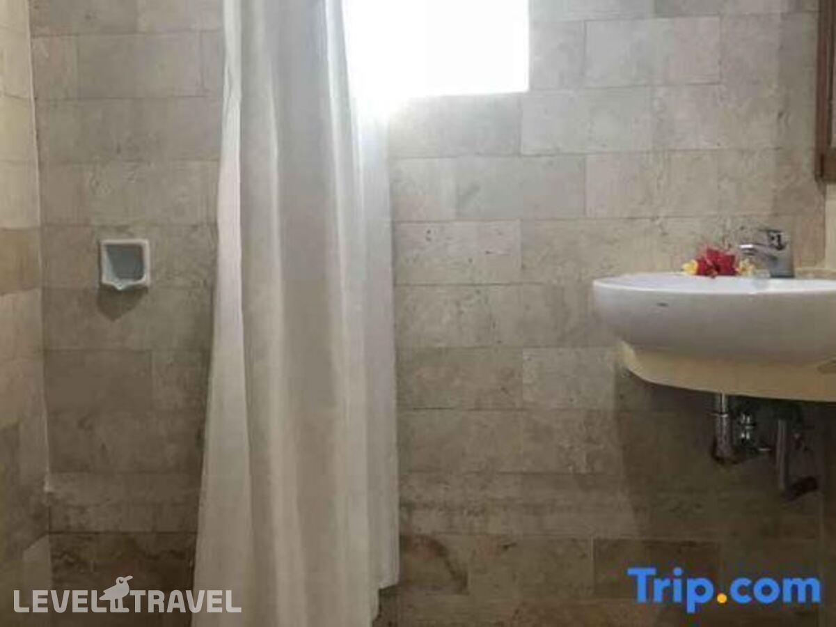 фотографии номера Стандартный номер отеля Melasti Beach Resort в Индонезия(Кута) - фото №132