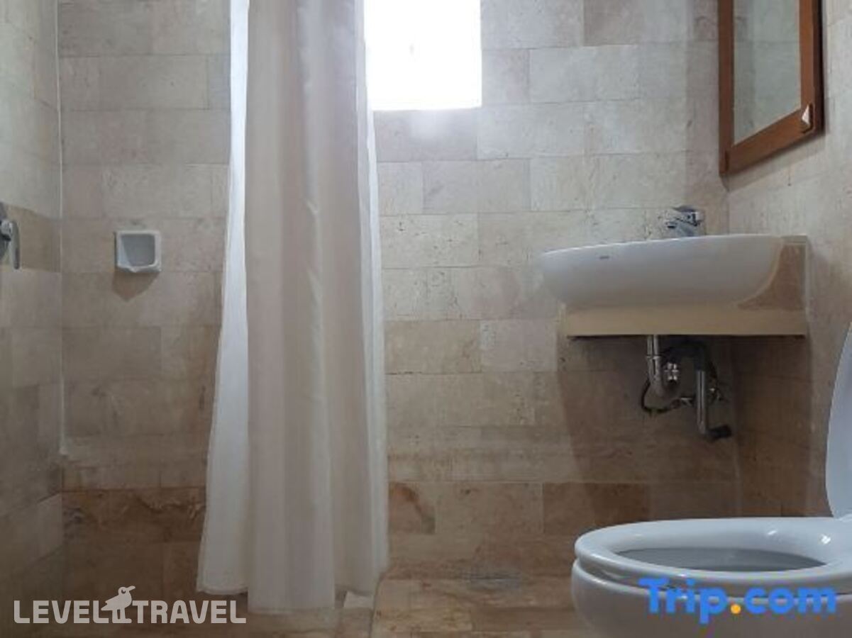 фотографии номера Стандартный номер отеля Melasti Beach Resort в Индонезия(Кута) - фото №133